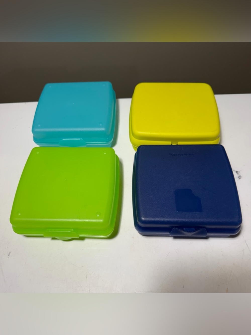 Tupperware Square Snack Containers in Aqua, Yellow, Lime, and Navy